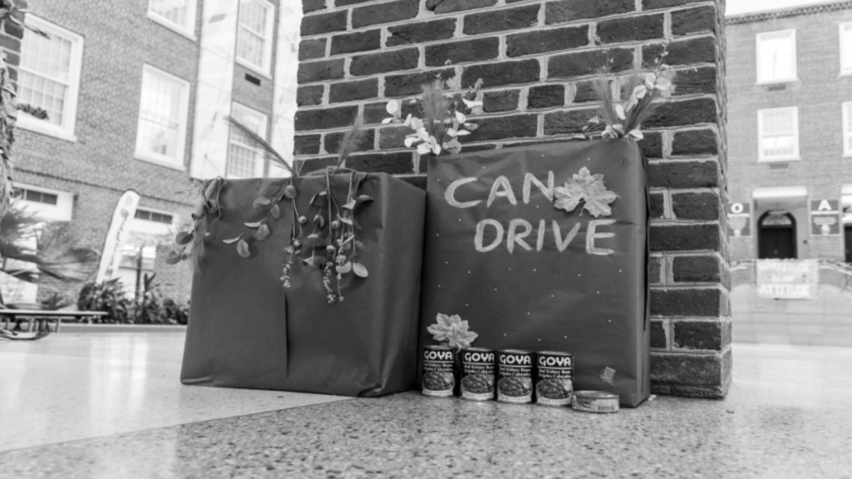 GIVING BACK - A can drive box sits at JR’s main entrance. The drive is one of many fundraisers planned by SGA, which aims to give back to the local community.